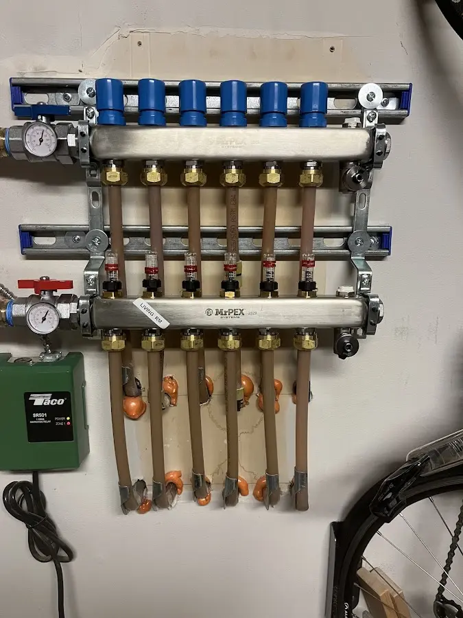 Plumber performing Water Heater Repair at a residential property in Shady Hollow